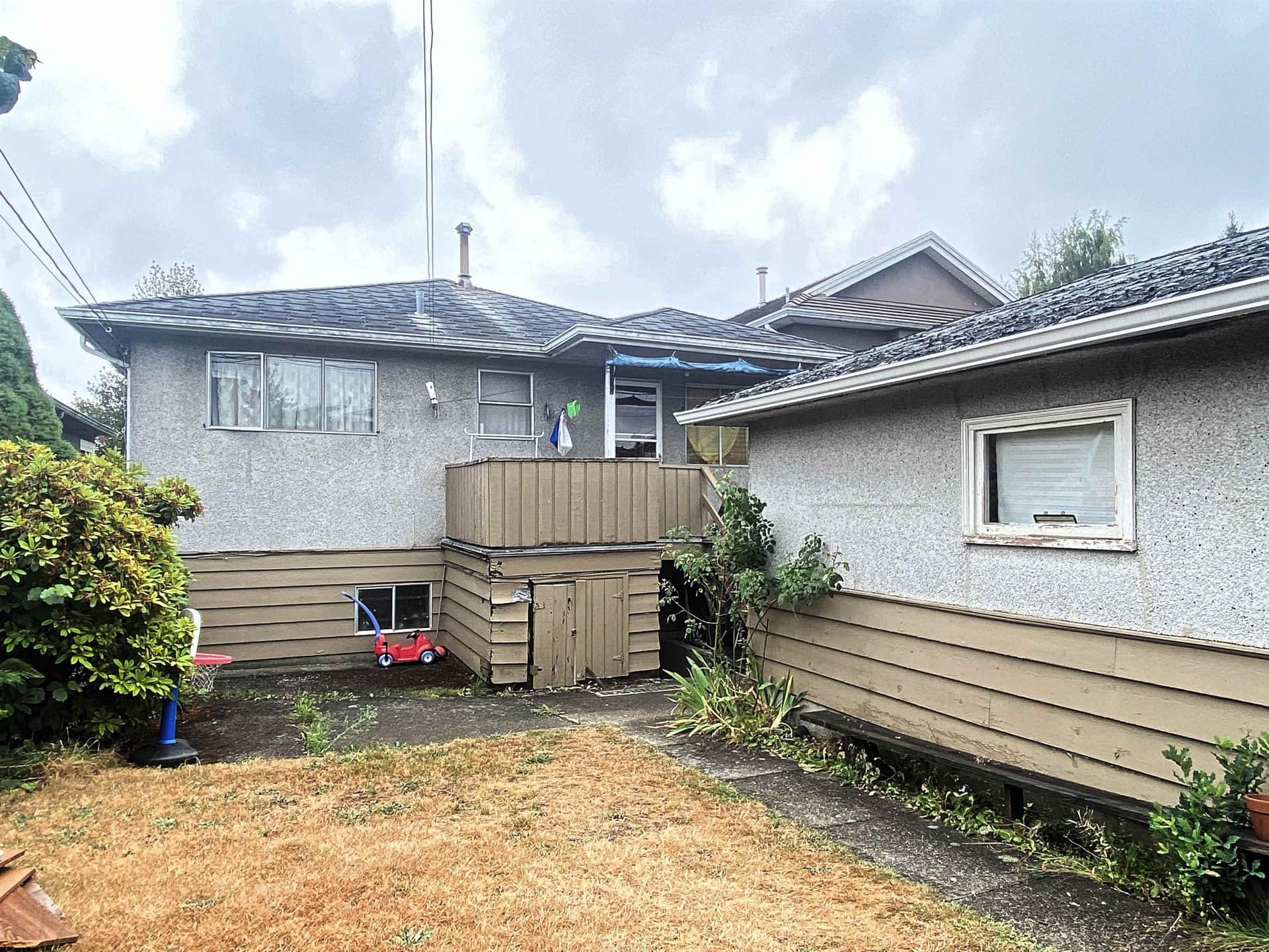 Rear exterior — 815 E 56th Avenue