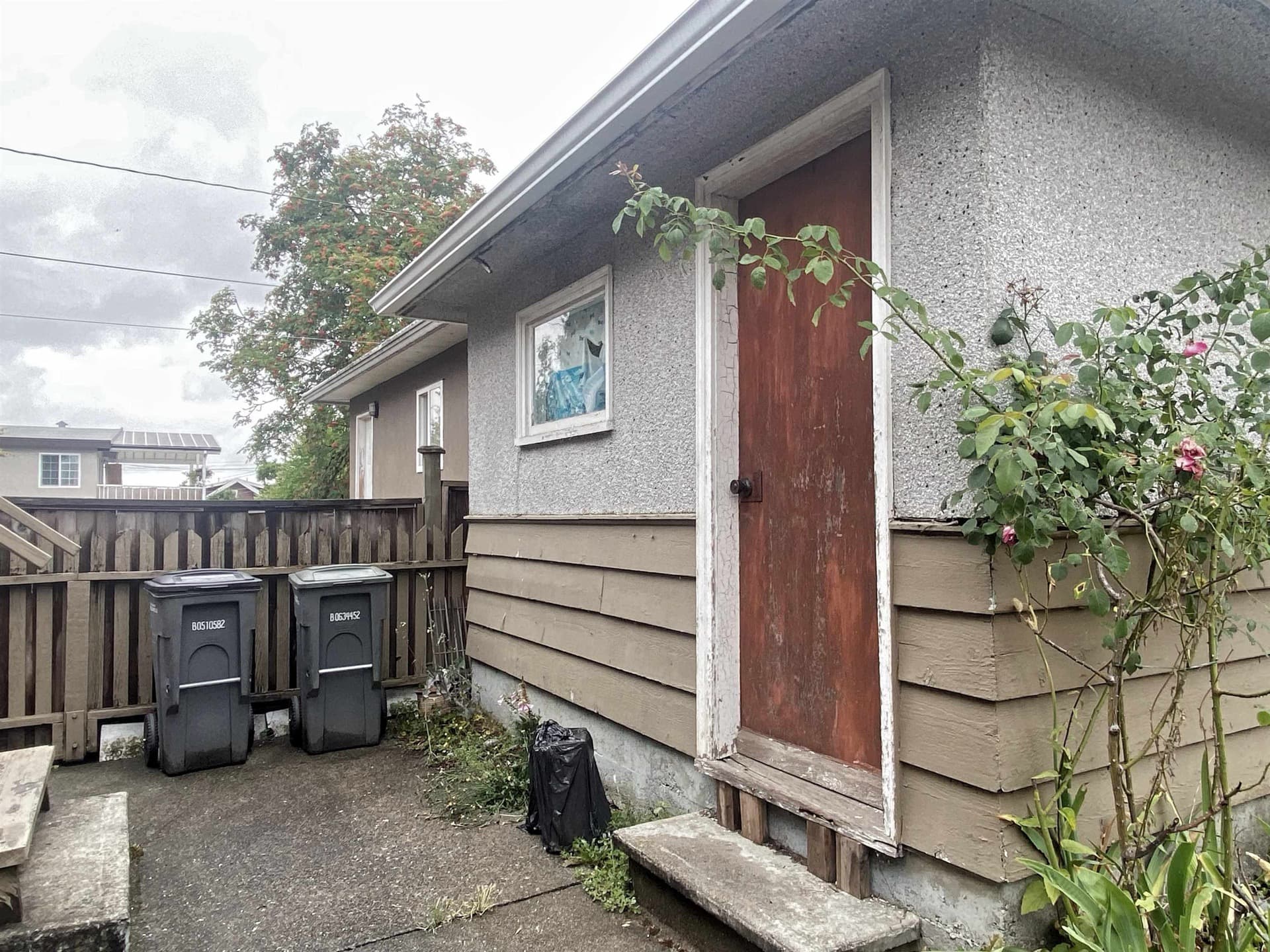 Rear exterior — 815 E 56th Avenue